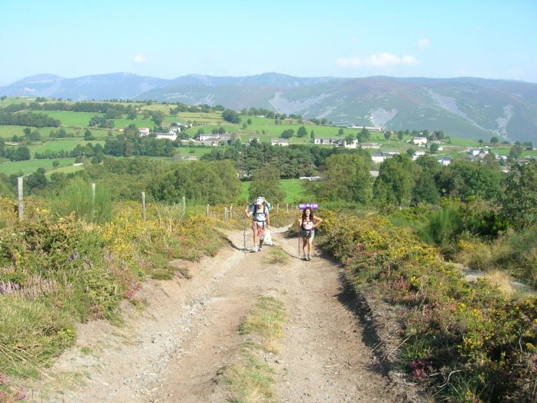 Pilgrims on a ridge path of the Camino Primitivo near Berducedo, in the mountains of Asturias