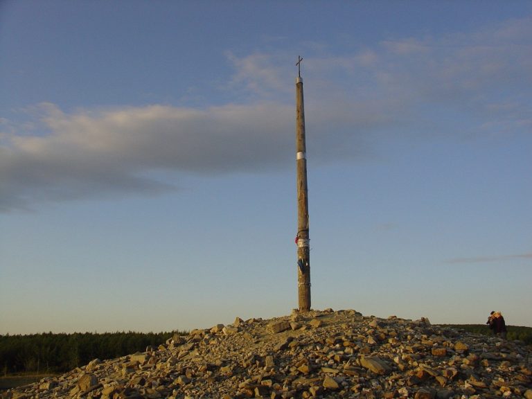 The Cruz de Ferro, an iron cross set on a mound of stones at the Foncebadón pass