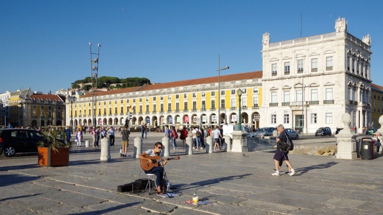 The Praça do Comércio in Lisbon, with its yellow arcaded façades