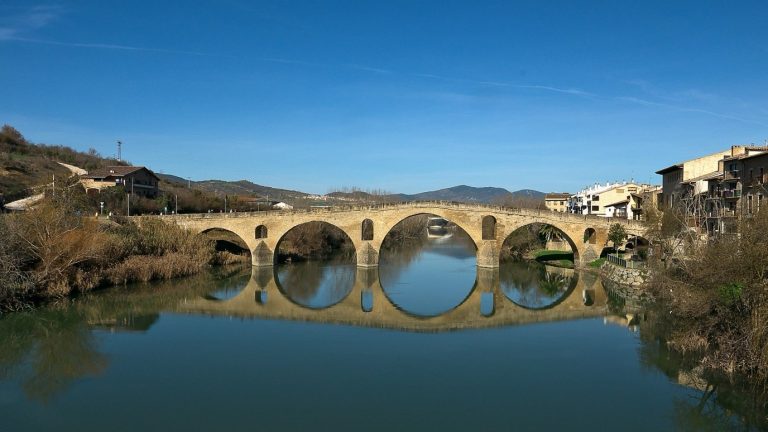 The Romanesque bridge of Puente la Reina over the river Arga