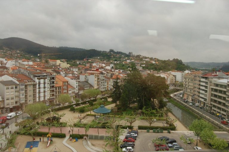 Redondela seen from the railway viaduct, with its park and apartment blocks