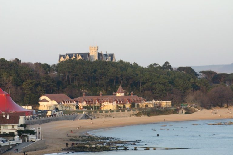 The Magdalena Palace on its wooded peninsula, above the beach, in Santander